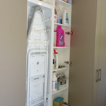 Laundry storage wall with ironing