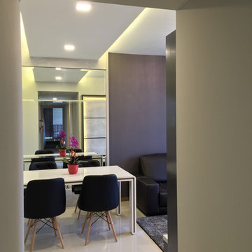 Dining with bevel-edge mirror to create space.