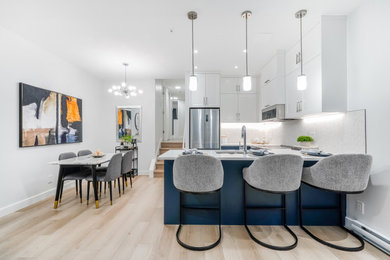Example of a transitional home design design in Vancouver