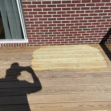 Deck stain and gutters power wash