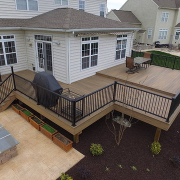 Timbertech legacy deck with aluminum rails with lighted post caps.