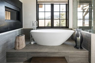 Inspiration for a mid-sized contemporary master gray tile and porcelain tile porcelain tile and gray floor bathroom remodel in Other with white walls and a hinged shower door