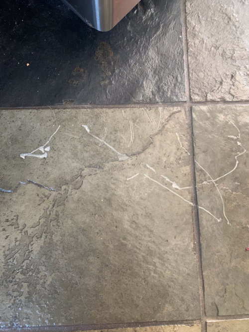 slate floor deep scratches