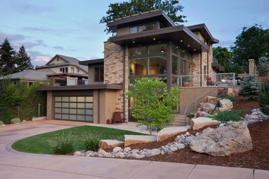 Mid-sized contemporary beige three-story mixed siding flat roof idea in Austin