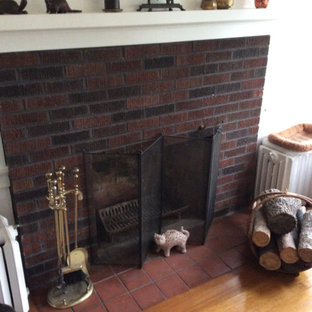 Rustikaler Wintergarten mit Kaminsims aus Backstein Ideen, Design