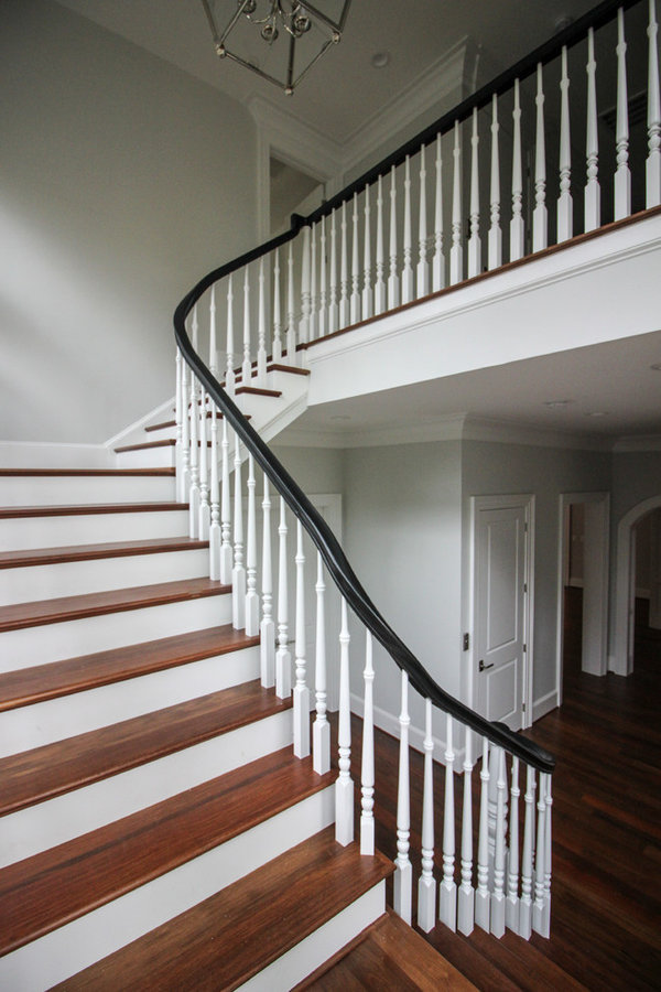 Powerful Impression by Floating Staircase in Suburban Foyer