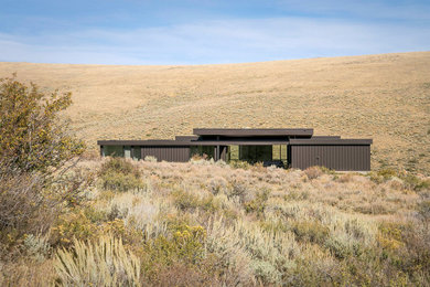 Mid-sized modern black one-story metal exterior home idea in Salt Lake City
