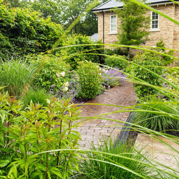 Textural Garden Planting with Grasses, Roses and Perennials