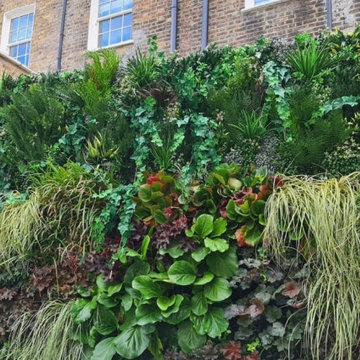 Custom Green Wall with Fake Green Foliage