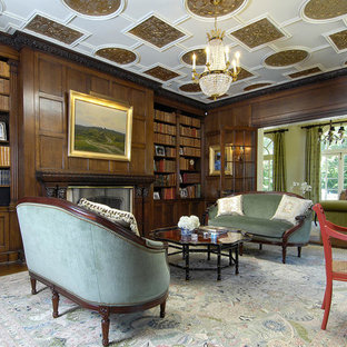 Design ideas for an expansive victorian study in New York with brown walls, carpet, a standard fireplace, a freestanding desk and a wooden fireplace surround.