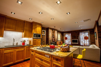 Small trendy l-shaped medium tone wood floor eat-in kitchen photo in Boston with medium tone wood cabinets, granite countertops, gray backsplash, ceramic backsplash, stainless steel appliances and an island