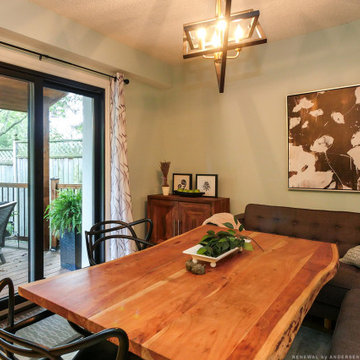Black Sliding Glass Door in Stylish Dining Area - Renewal by Andersen Greater To