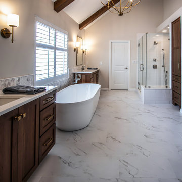 Luxury Spa Bathroom with Natural Warm Vanities, Quartz Countertop, Tiled Shower