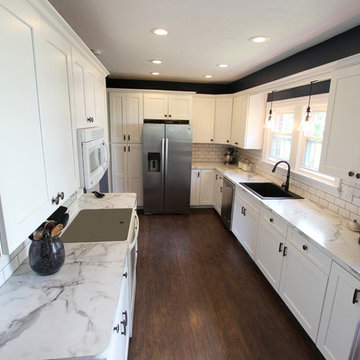 White Kitchen with Marble Look Laminate Countertop ~ Akron, OH
