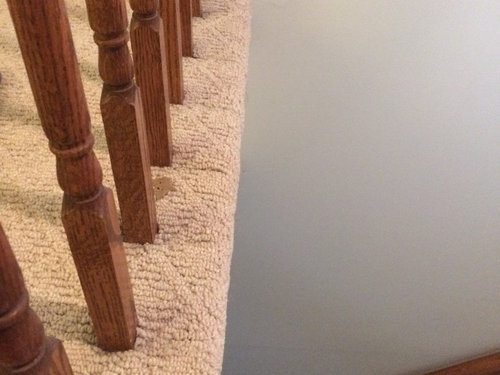 How To Install Laminate Under Baers, Installing Laminate Flooring Around Stair Spindles