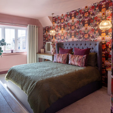 Maximalist bedroom with pendant lights