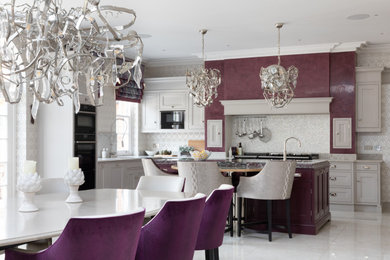 Photo of an expansive traditional grey and purple u-shaped kitchen/diner in Surrey with a built-in sink, all styles of cabinet, grey cabinets, marble worktops, multi-coloured splashback, mosaic tiled splashback, integrated appliances, porcelain flooring, an island, grey floors, purple worktops and a chimney breast.