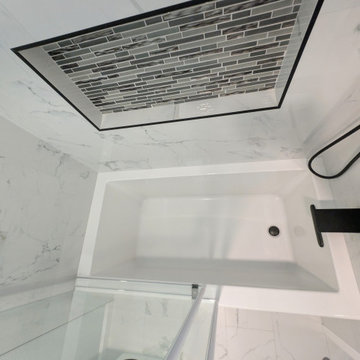 Modern Bright Monochromatic Tub & Shower Remodel with Calacatta Porcelain Tile