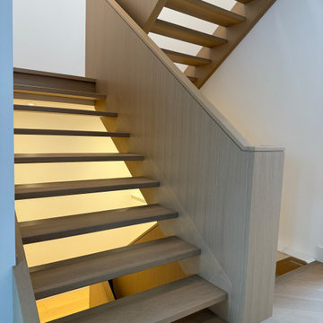 Architectural Wood Staircase with Integrated Lighting – Oakville