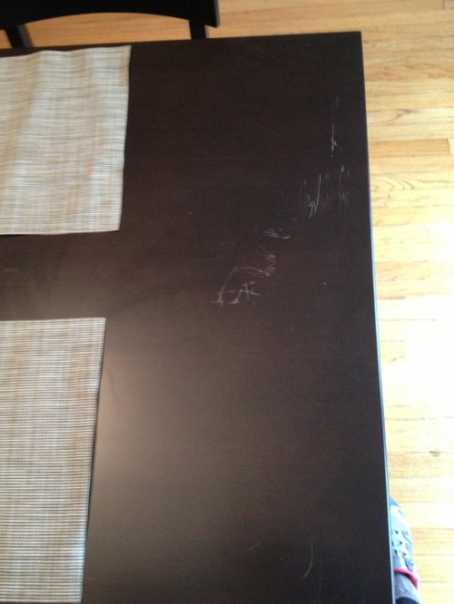 How to fix scratched dining room table