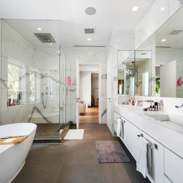 Master Bathroom With Corner Shower and Bath Tub