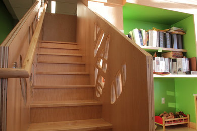 Photo of a mid-sized contemporary staircase in New York.