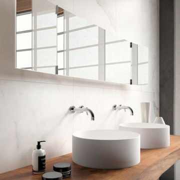 Modern white bathroom with matte marble look tiles