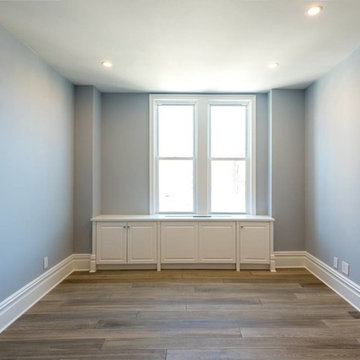 Bedroom with custom PTAC cover