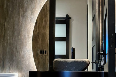 Mid-sized transitional porcelain tile, beige floor and wallpaper powder room photo in Phoenix with open cabinets, brown cabinets, a one-piece toilet, multicolored walls, a vessel sink, brown countertops and a floating vanity
