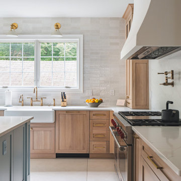 Scandinavian Kitchen with Light Oak Cabinets and Quartzite Island