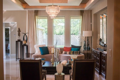 Inspiration for a mid-sized transitional formal and open concept porcelain tile and white floor living room remodel in Other with beige walls, no fireplace and no tv