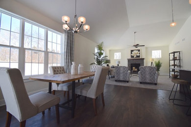 This is an example of a transitional dining room in Milwaukee.