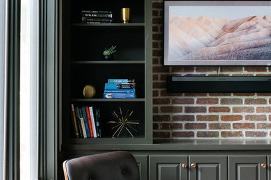 Study room - large transitional freestanding desk dark wood floor and brown floor study room idea in Minneapolis with gray walls