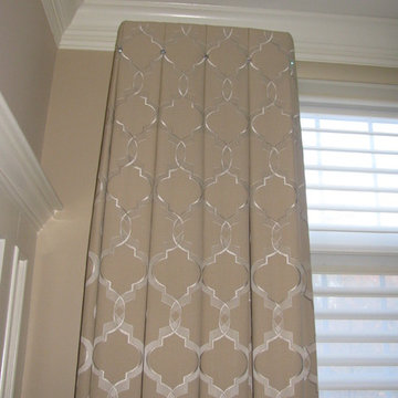 Box pleated draperies pleated to the pattern