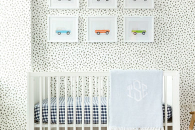 Inspiration for a transitional boy dark wood floor nursery remodel in Other with multicolored walls