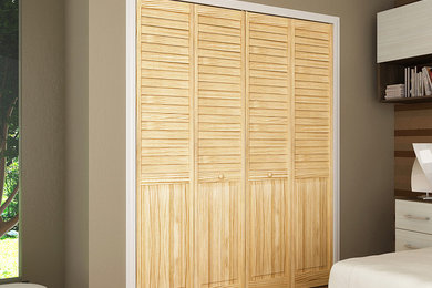 Inspiration for a mid-sized timeless gender-neutral walk-in closet remodel in Baltimore