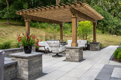 Trendy backyard patio photo in Milwaukee