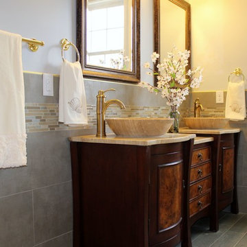 TRANSITIONAL BATHROOM WITH TRAVERTINE STONE TOP & VESSEL SINKS