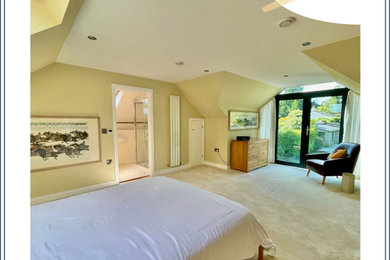Photo of a medium sized contemporary master bedroom in Cornwall with brown walls and a coffered ceiling.