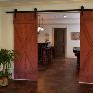 Photo of a medium sized classic fully buried basement in Atlanta with beige walls, terracotta flooring and no fireplace.