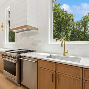 Sunlit Kitchen Wall with Shiplap Hood & Wide Windows