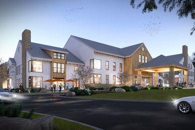 Example of a large farmhouse home design design in Other