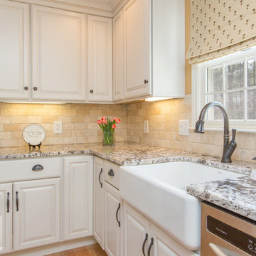 White Kitchen with maple Island