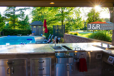 Inspiration for a large modern beige exterior home remodel in Columbus