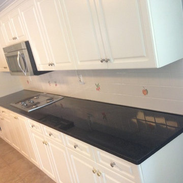 Updating White "Builder Grade" Kitchen Cabinets