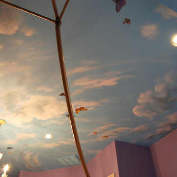 Sky Ceiling Mural with Butterflies, hand-painted in a bedroom by Mural Art LLC.