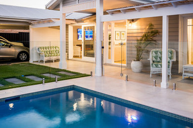 Mid-sized beach style pool in Gold Coast - Tweed.