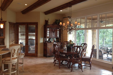 Large elegant ceramic tile kitchen/dining room combo photo in Dallas with beige walls and no fireplace