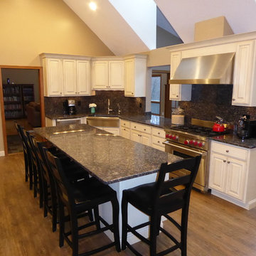 Roasted Marshmallow on Alder Cabinets, with Sapphire Blue Granite Countertops