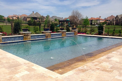 Pool - large transitional backyard stone and rectangular lap pool idea in Dallas